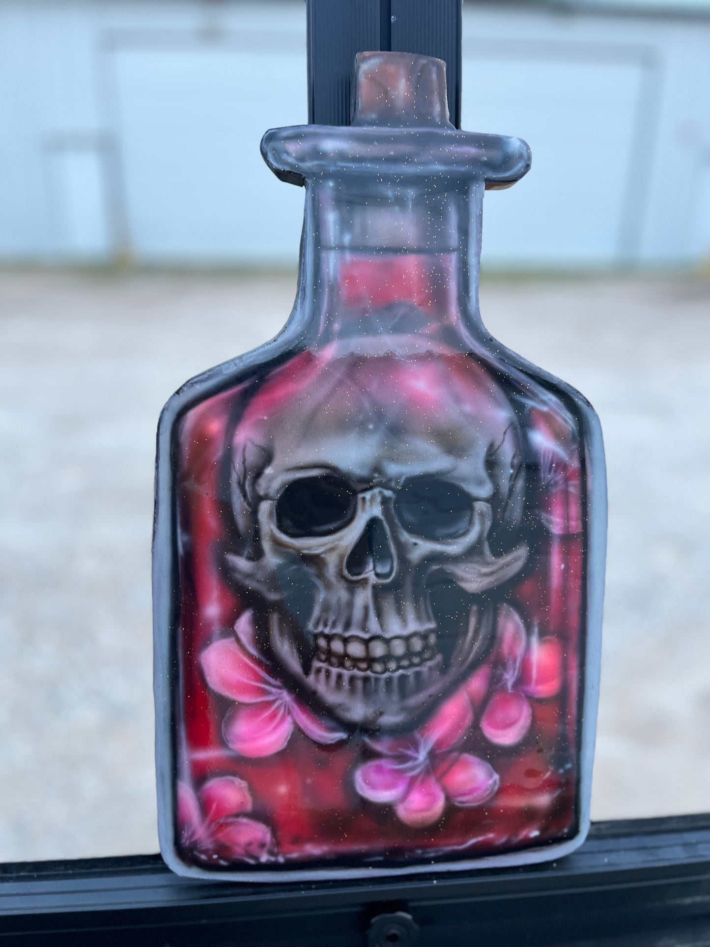 Skull in Bottle of Flowers