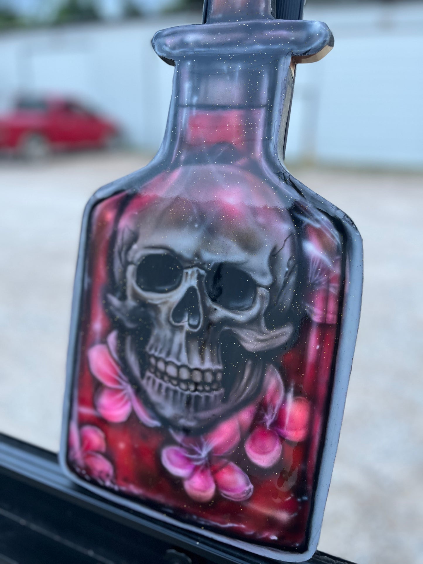 Skull in Bottle of Flowers