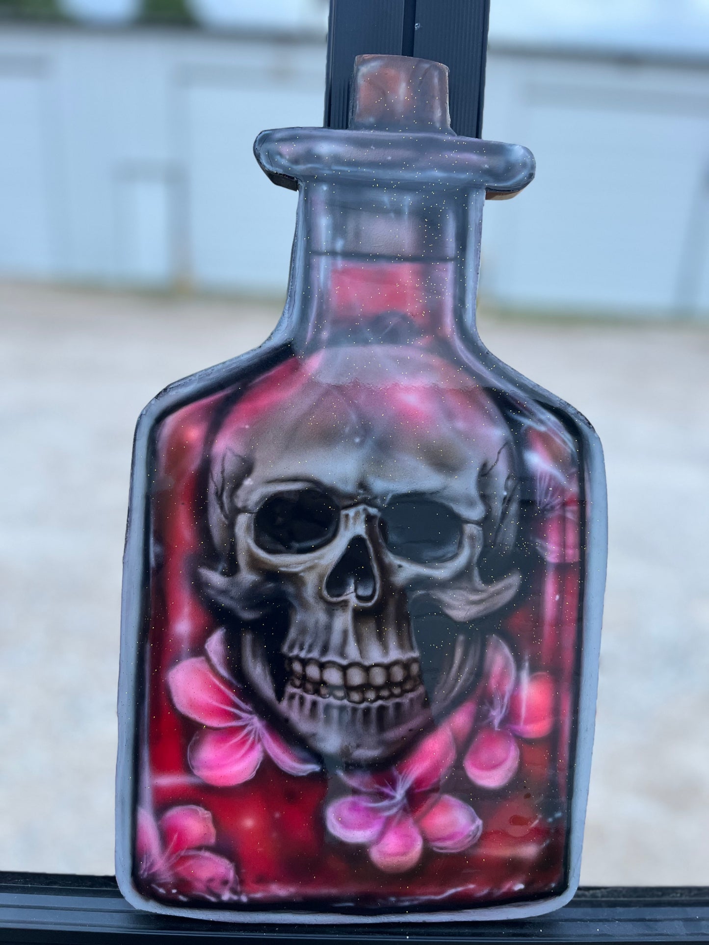 Skull in Bottle of Flowers