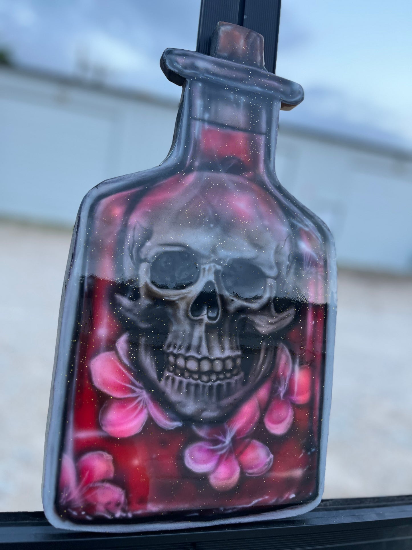 Skull in Bottle of Flowers