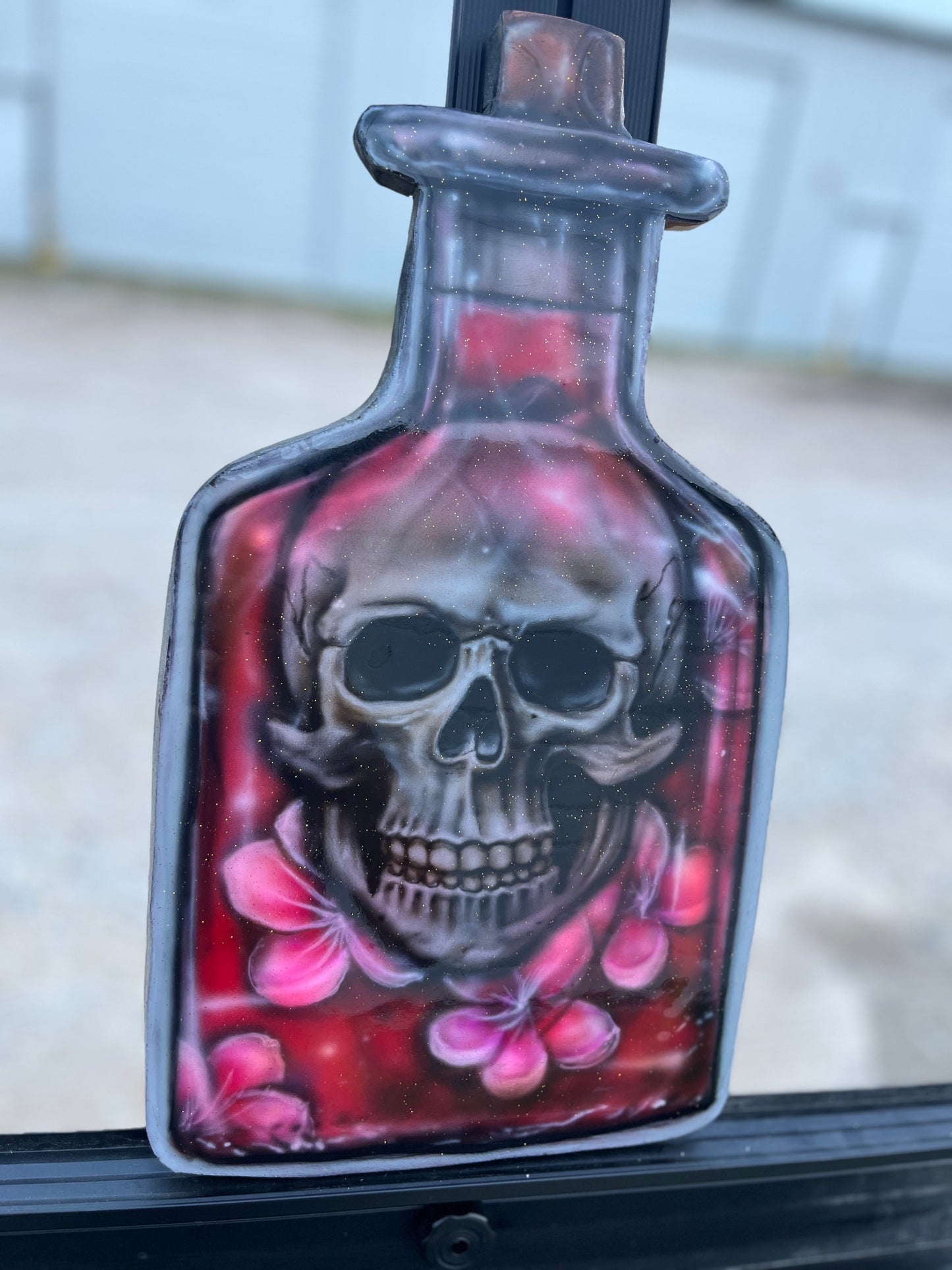 Skull in Bottle of Flowers